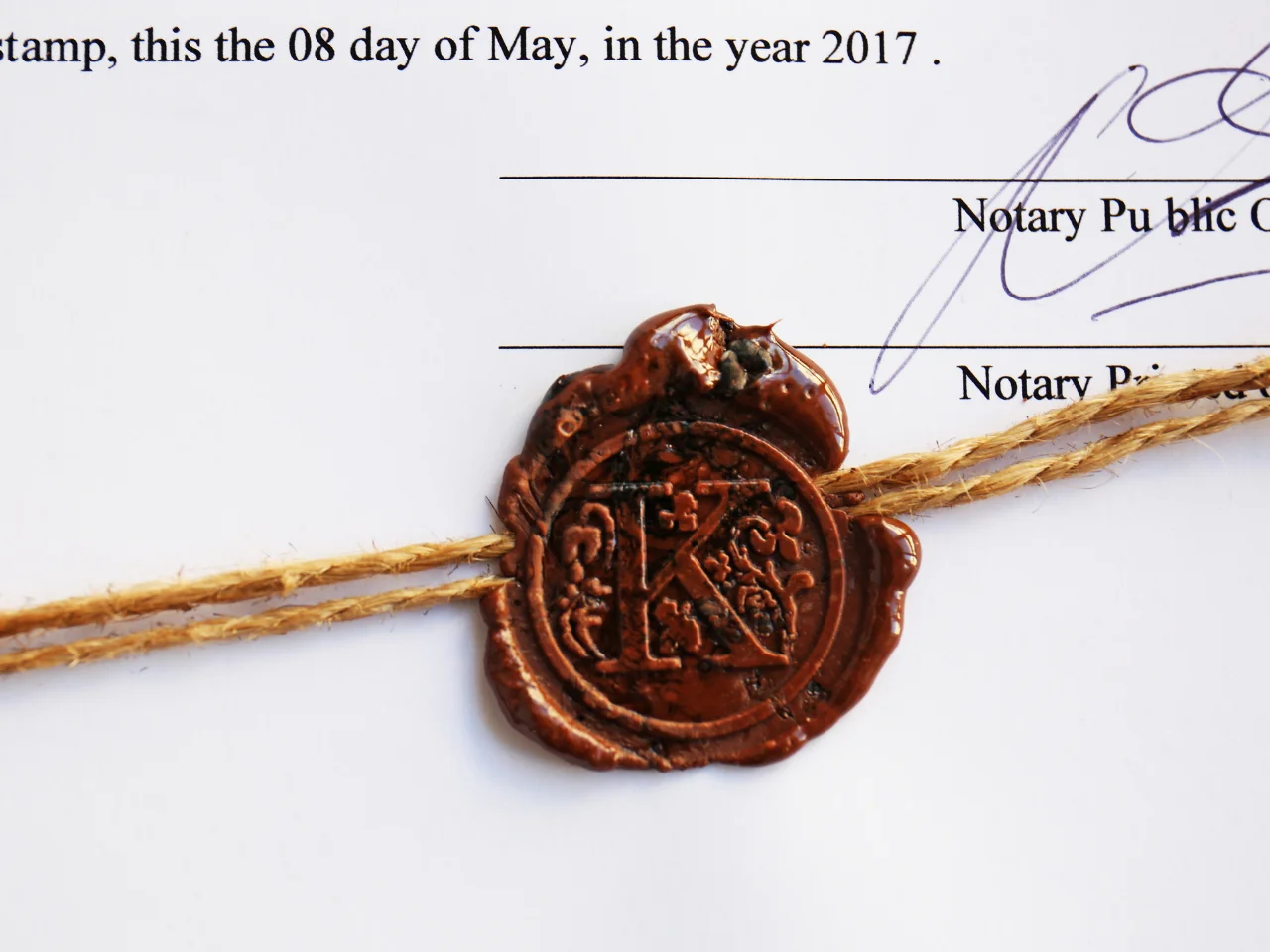 Notarized legal document with official seal for authentication and international use.