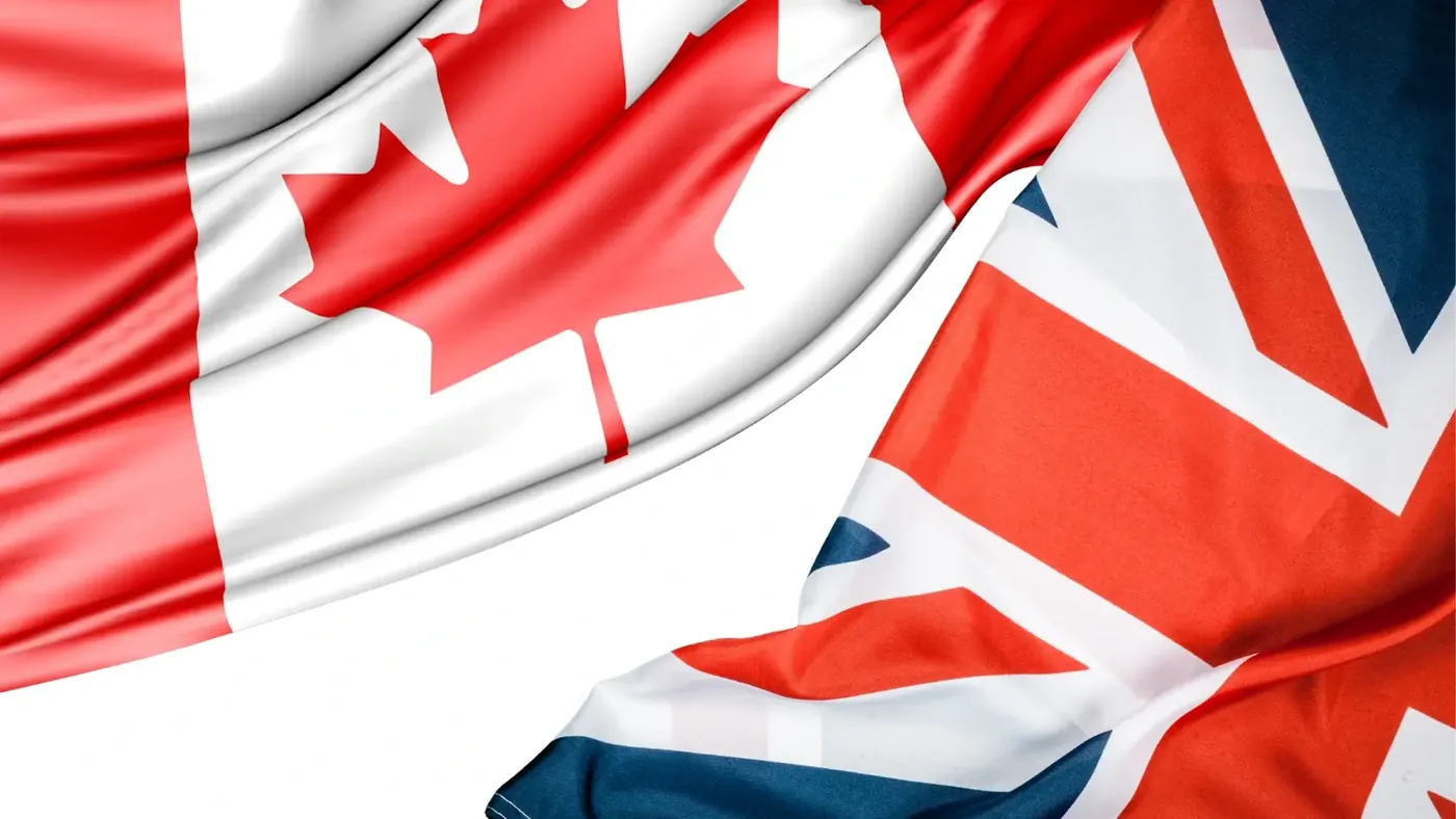 Canadian and British flags side by side, symbolizing the contrasts in spelling, grammar, and word choice between Canadian and British English.