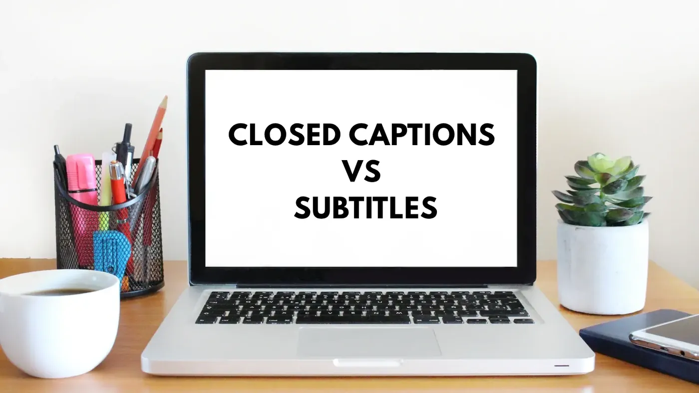Laptop displaying closed captions vs subtitles comparison.