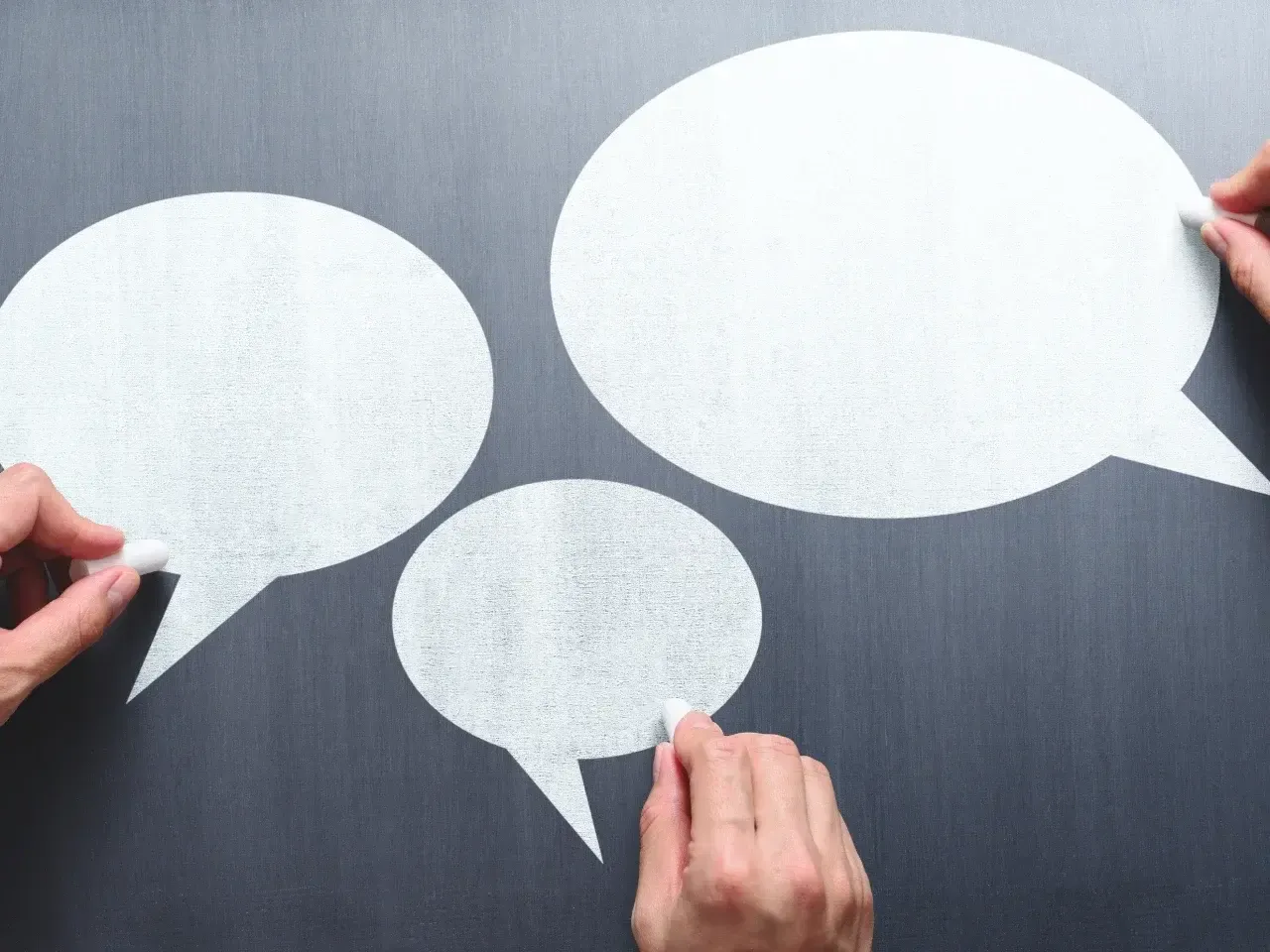 Speech bubbles representing different dialects and language communication.