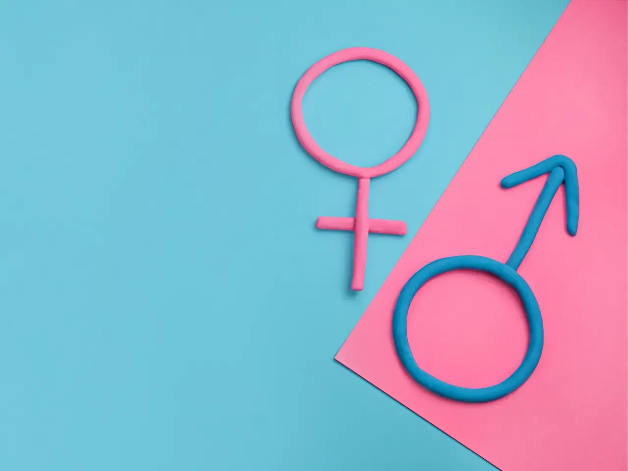Male and female gender symbols illustrating gender distinctions in language.