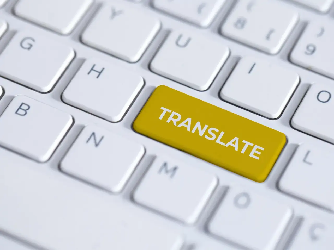 Keyboard with translate key representing language and translation services.