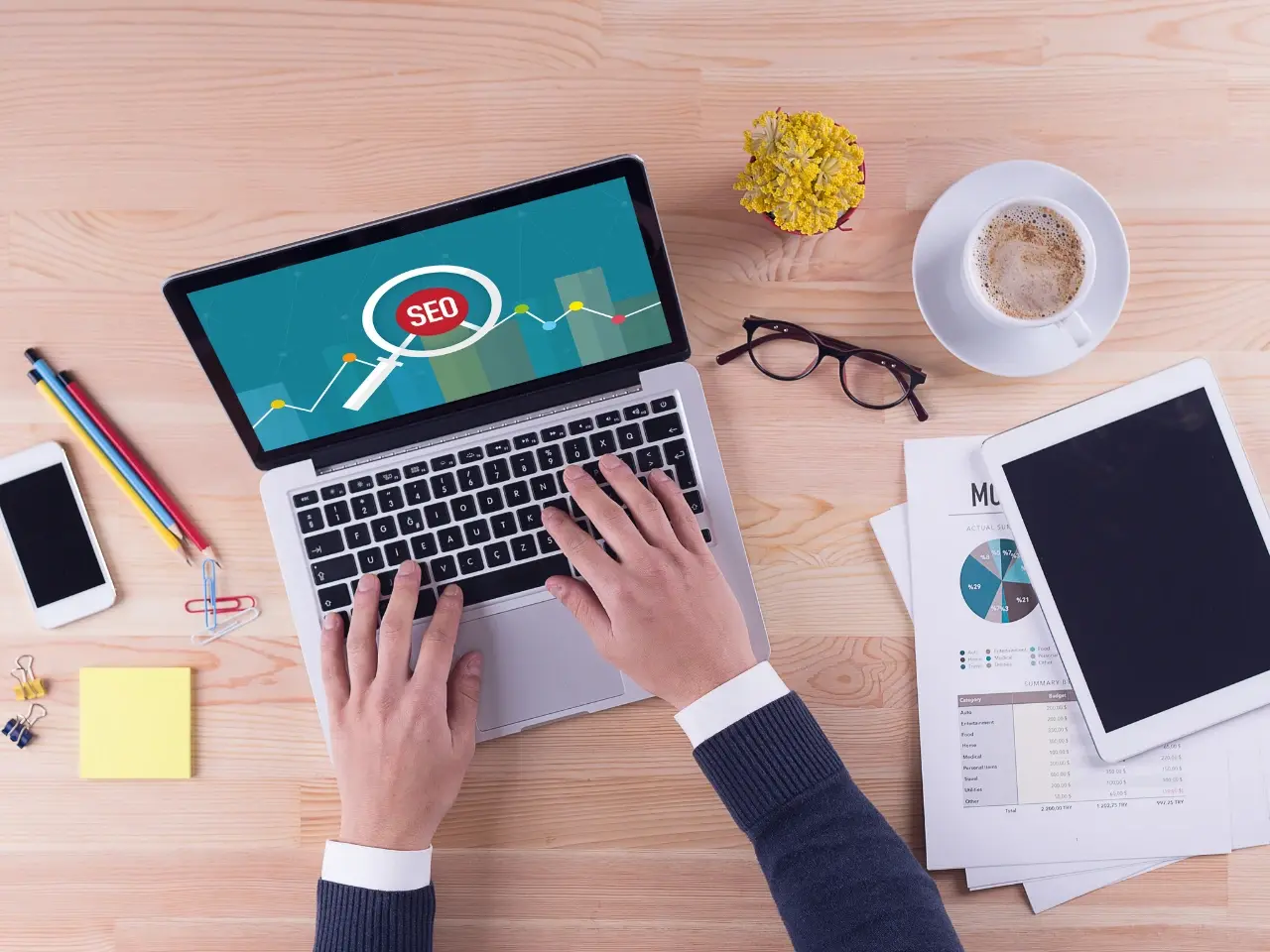 Hands on laptop assessing site speed and technical SEO metrics for global optimization.