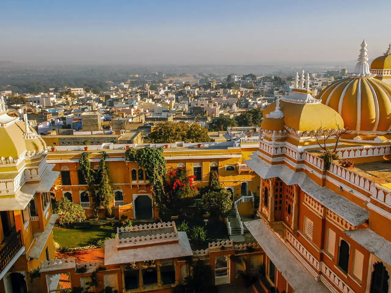 Historic Indian cityscape representing regional language and cultural identity.