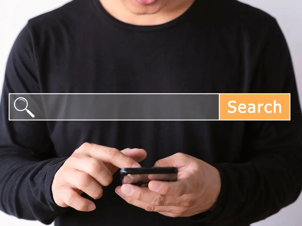 Person using a mobile search bar, symbolizing research and choosing the right target languages and regions.