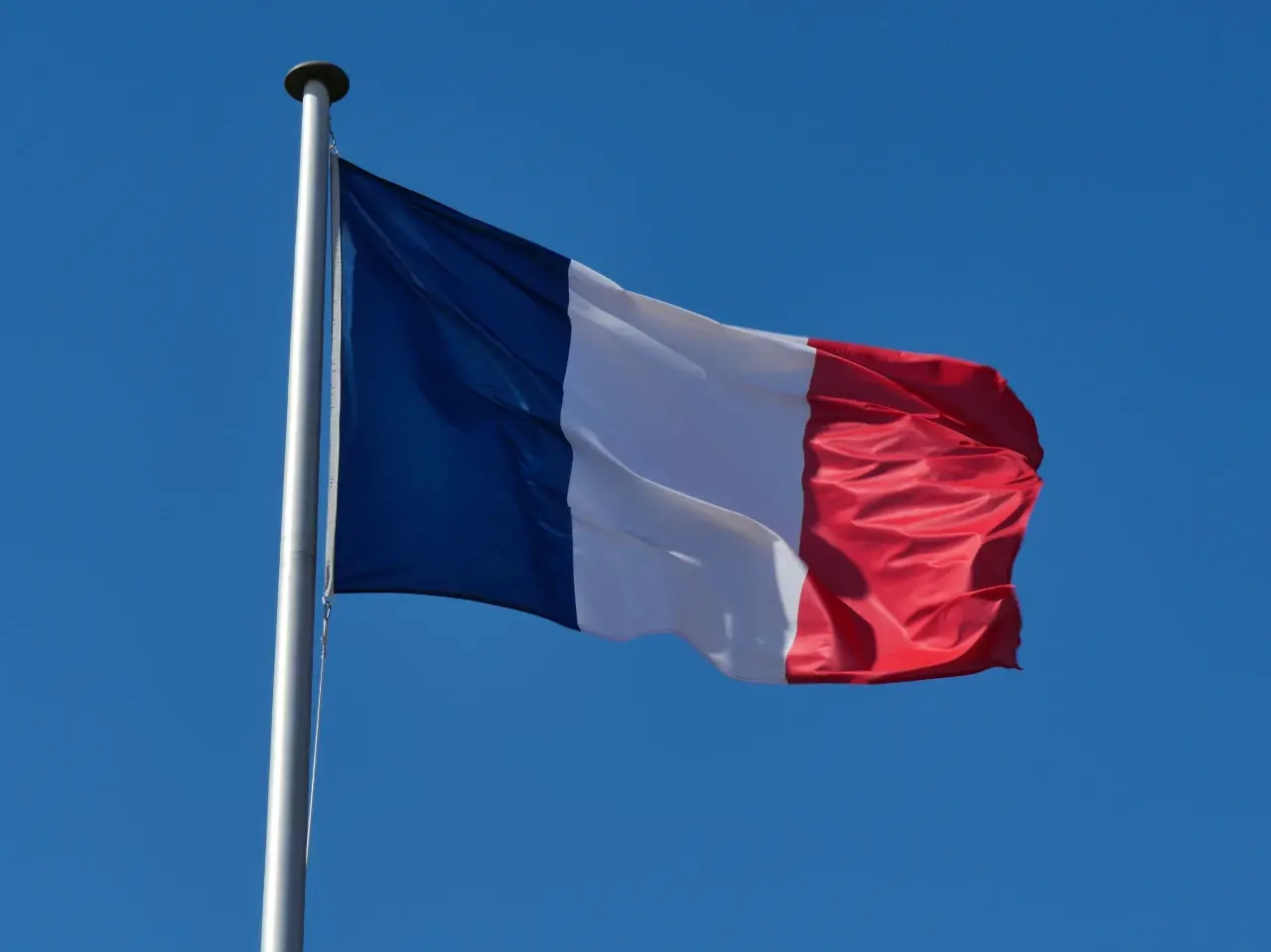 French flag representing one of Canada’s two official languages alongside English.