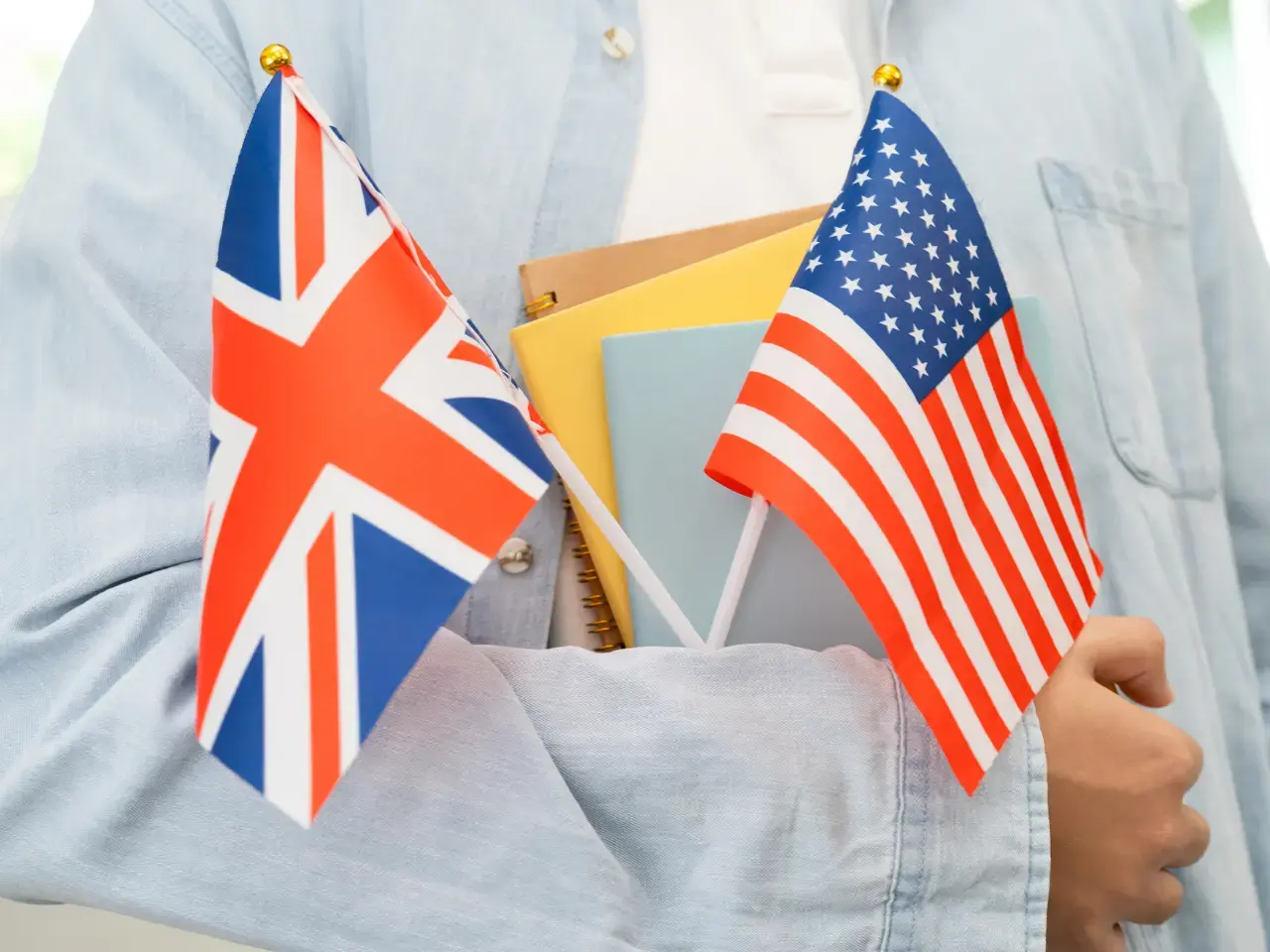 British and American flags representing different English language varieties.