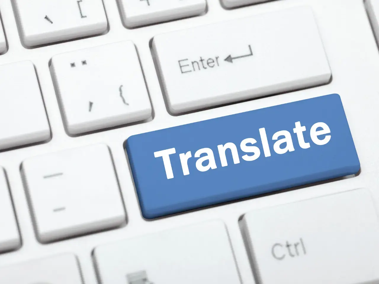 Keyboard translate button representing translation between global English varieties.