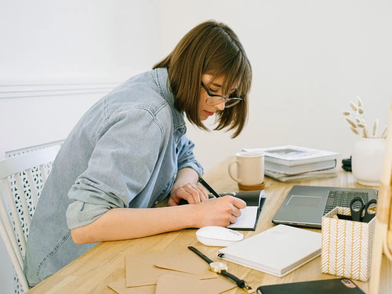 Studying language concepts and translation examples at the desk.