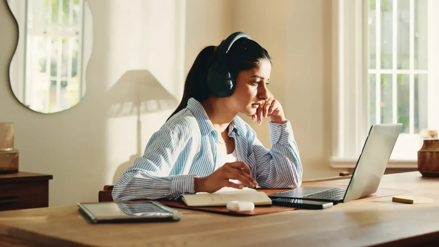 Listening to recorded audio for accurate transcription.