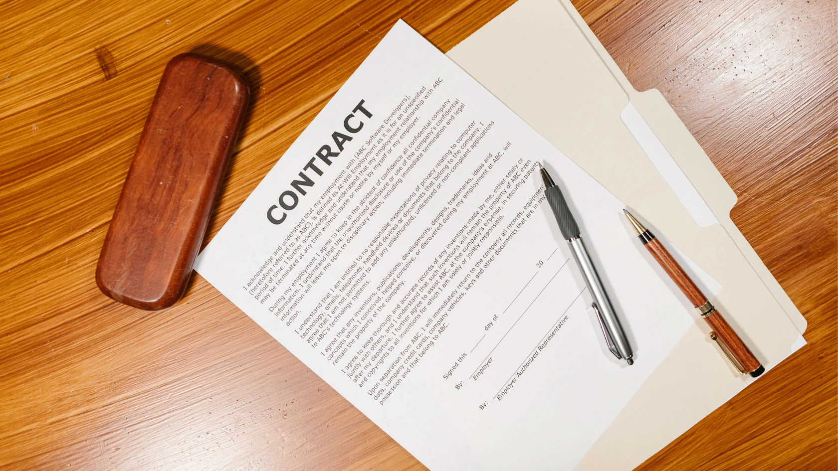 Employment contract and legal documents representing workplace agreements in Canada.