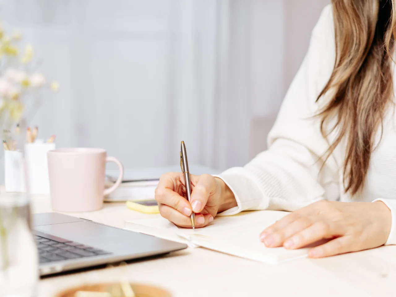 Business professional preparing documents for a Health Canada cosmetic notification.