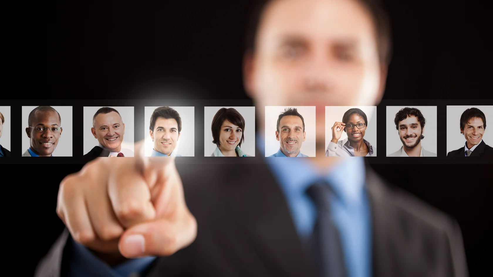 Business employer reviewing candidate profiles for a foreign worker position.