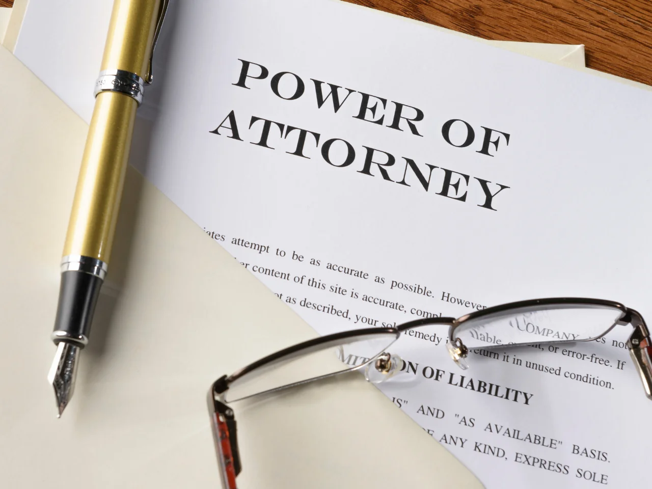 Power of attorney legal document with pen and eyeglasses prepared for notarization, apostille, or international legal use.