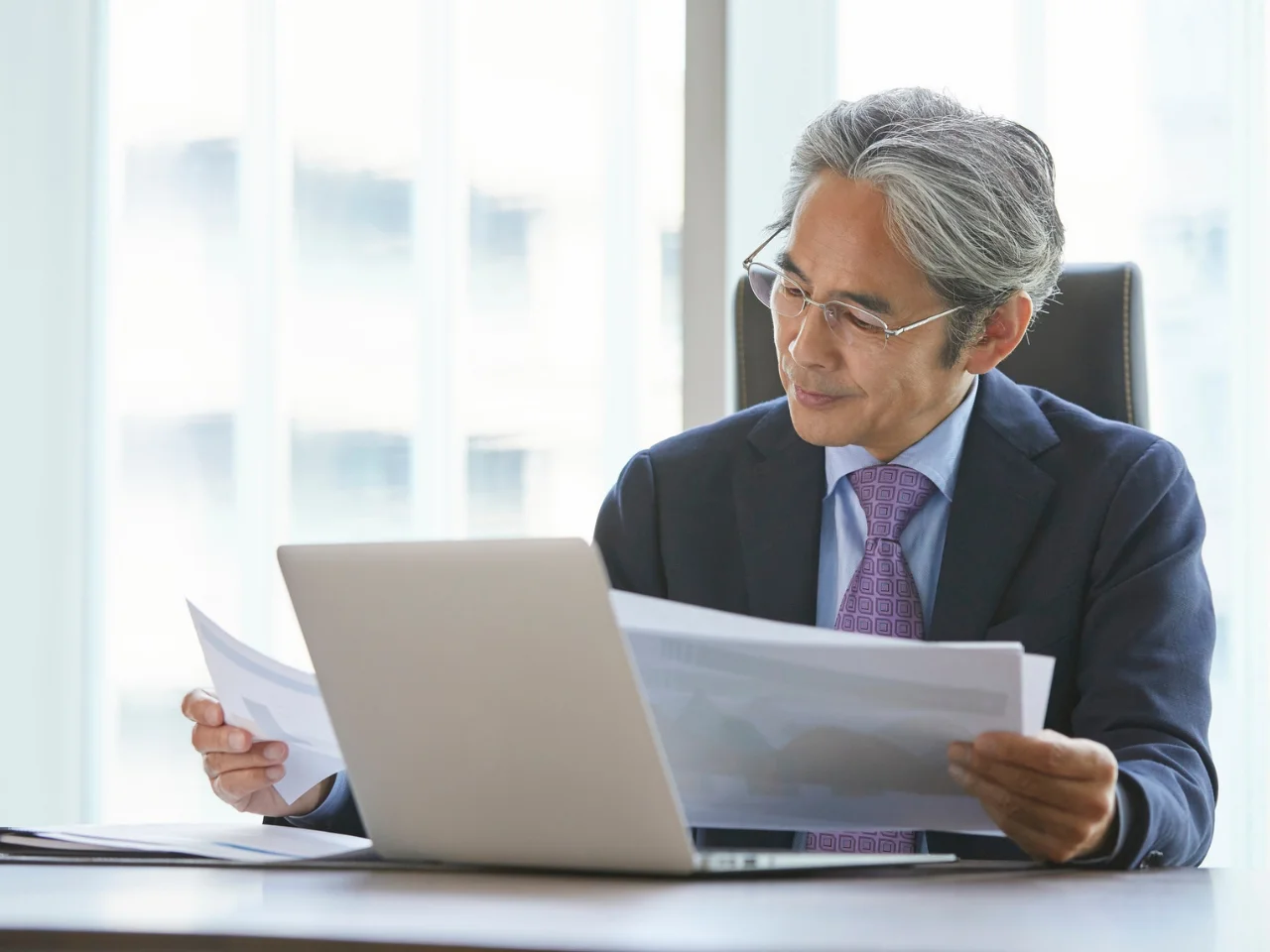 Employer reviewing compliance documents for an intra-company transfer Canada work permit.