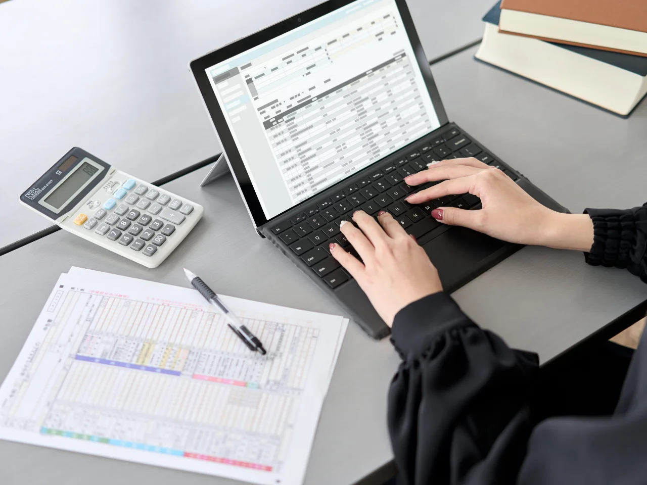 Applicant reviewing financial records to calculate settlement funds for Canada Express Entry.