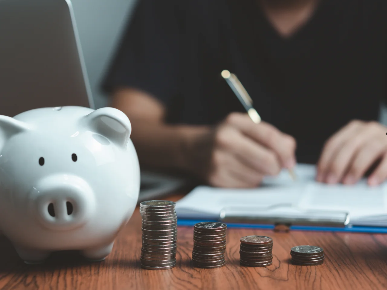 Piggy bank and savings representing proof of funds for a Canada Express Entry application.