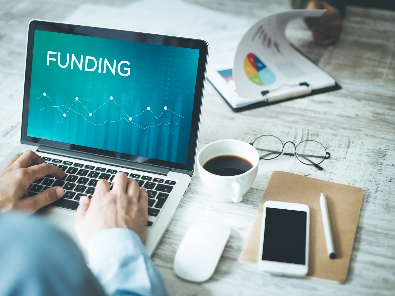 Applicant reviewing funding and financial records before submitting a Canada Express Entry application.