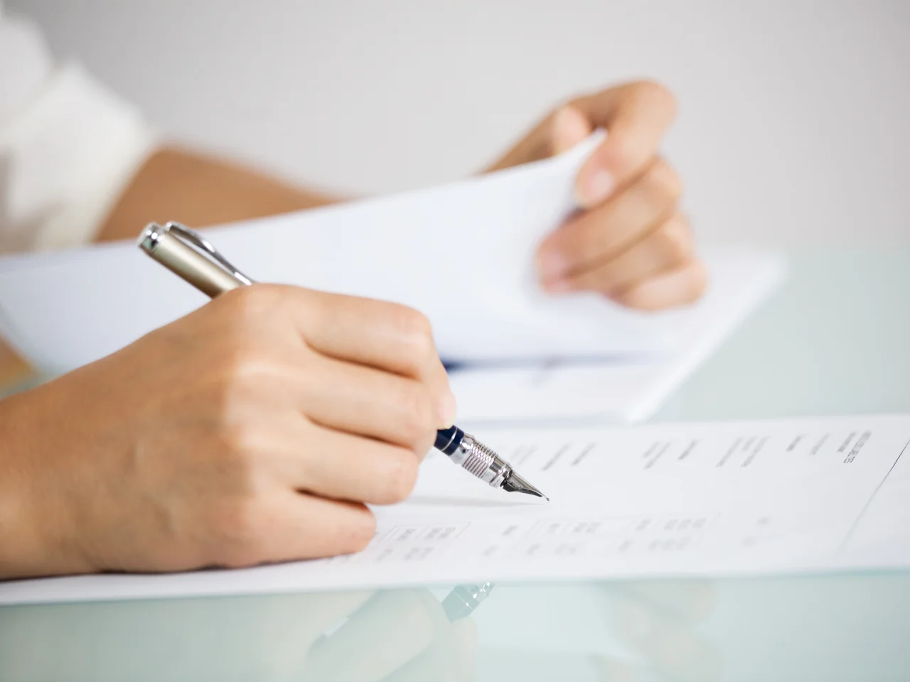 Person signing a single status affidavit for marriage abroad requirements.